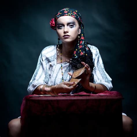 Gypsy Fortune Teller Mixing The Tarot Cards. Stock Images - Image: 18435654