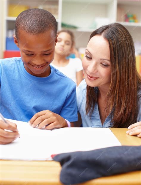 Premium Photo | Education classroom and teacher with child for help