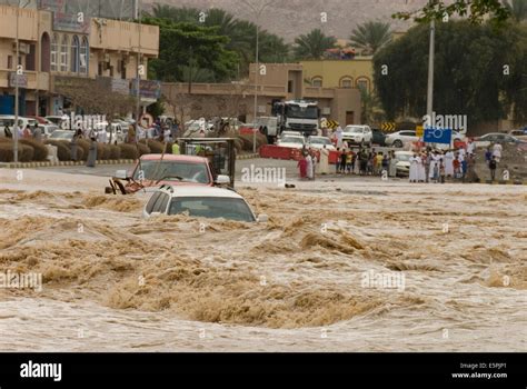 A flash flood in the wadi through the centre of town, Nizwa, Oman ...