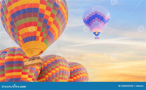 Multi Color Hot Air Balloon Flying Over Sunrise Sky Stock Photo Image