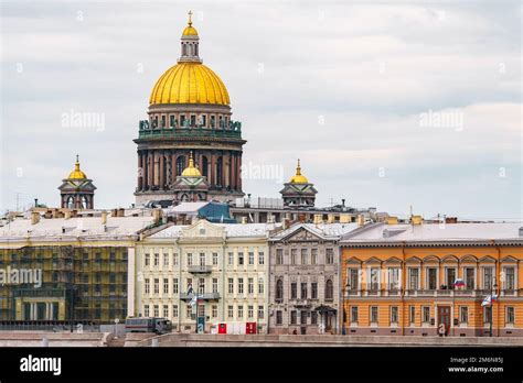 The Huge Golden Dome Of St Isaac S Cathedral Through The Roofs Of