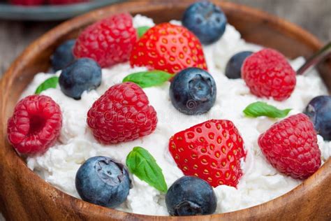 Healthy Breakfast Cottage Cheese With Berries And Basil Stock Photo