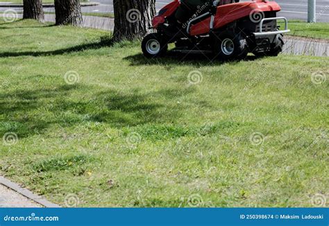 Red Lawn Mower Cutting Grass Stock Photo Image Of Maintenance Mower