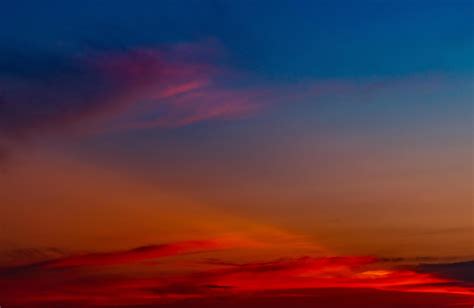 Dramatic red and blue sky and clouds abstract background. Red-blue ...