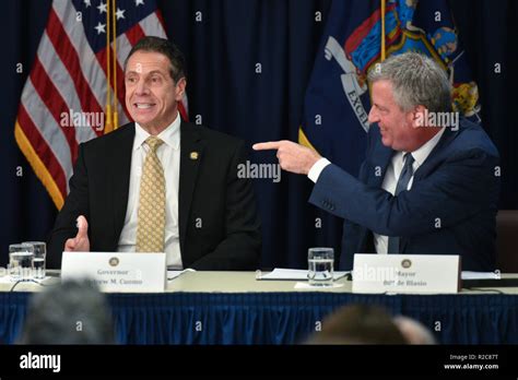 New York Governor Andrew Cuomo L And New York City Mayor Bill De