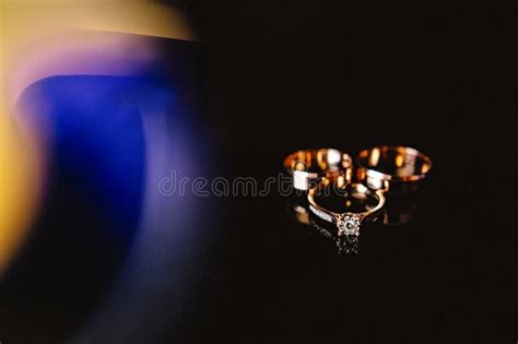 Diamond Rings on Black Chic Wedding Rings with Diamonds on a Black ...