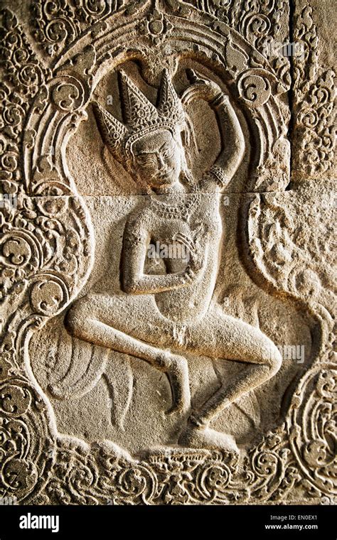 Bas Relief Sculpture Of Dancer In Angkor Wat Cambodia Stock Photo