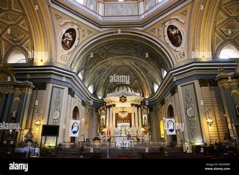 The interior of the Basilica St Martin de Tours in the heritage town of Taal, Batangas ...