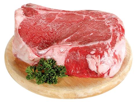 Raw Beef Rib Eye Steak On A Wooden Board Prepared Food Photos Inc