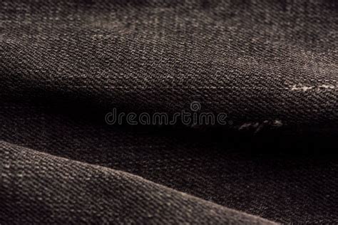 Black Denim Fabric Texture. Black Jeans Denim Cloth Fragment As a ...