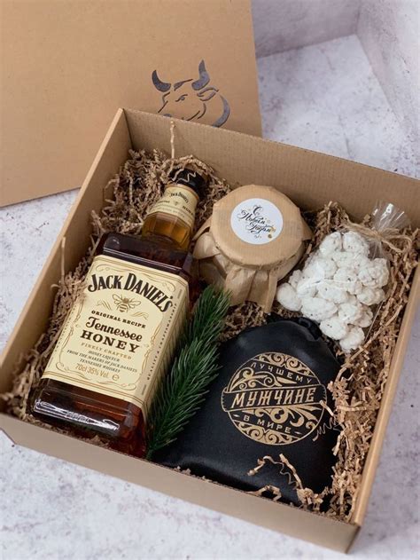 An Open Box With Some Bottles And Other Items In It On A White Counter Top