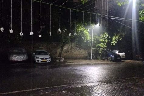 Rain Delhi Breathes A Sigh Of Relief As Rain And Lightning Grace The