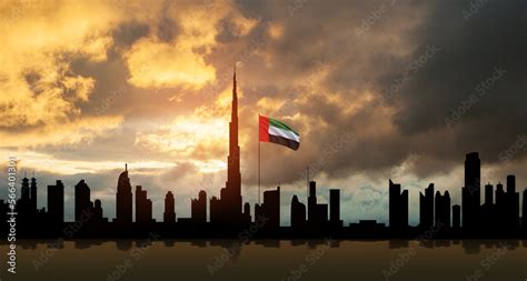 United Arab Emirates flag and Dubai skyline view at sunset. UAE ...