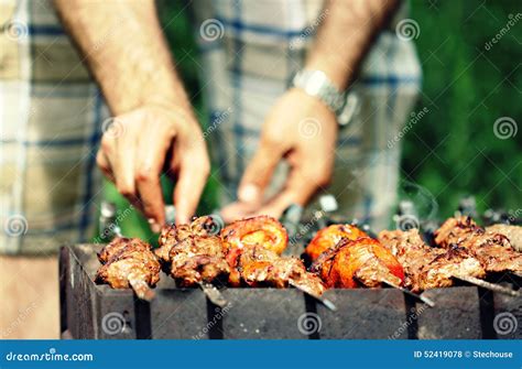 Man Flips Meat Skewers At Summer Barbecue Stock Photo Image Of Tender