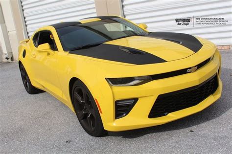 2016 Yellow Chevrolet Camaro With A Carbon Stripe Wrapped By Superior