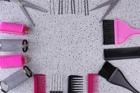 Premium Photo | Professional hairdresser tools on gray background