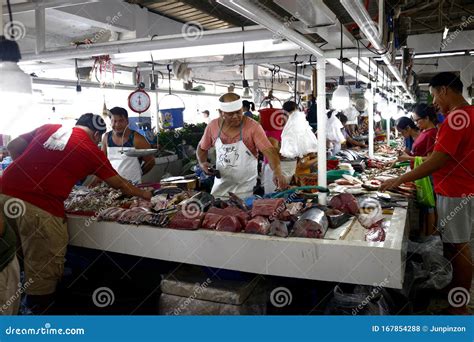 Vendors At A Public Wet Market Sell Fish And Other Seafood To Customers