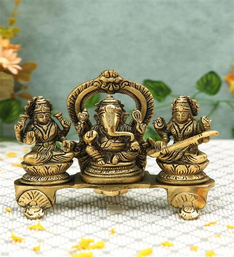 Buy Ganesh Laxmi Saraswati Set Gold Brass Idol At 13 OFF By Imli