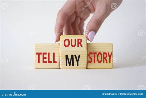 Tell Our Or My Story Symbol Businessman Hand Turns Wooden Cubes And