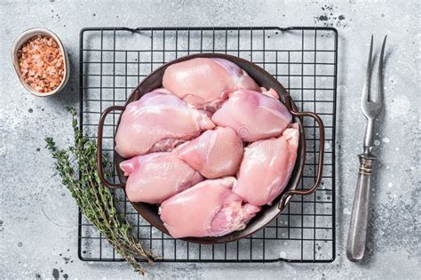 Boneless And Skinless Raw Chicken Leg Thigh Fillet Gray Background