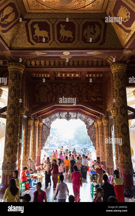 A Lot Of People Inside The Shwedagon Pagoda S Ornate Eastern Entrance