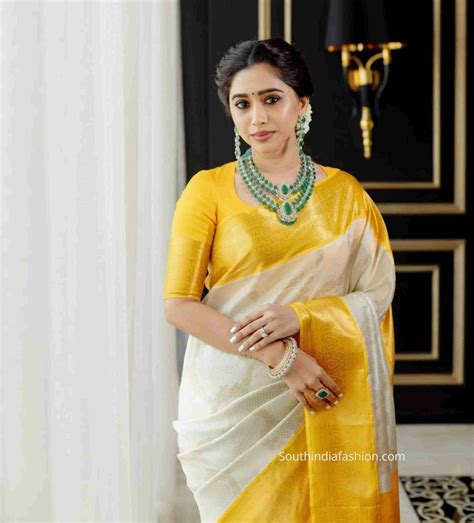 Aarti Ravi Looks Elegant In A White And Yellow Silk Saree South