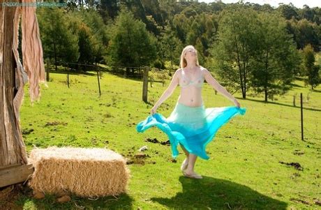 Plain Looking Blonde Girl In Glasses Strips Off Blouse And Skirt