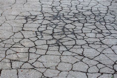 Asphalt on the Road is Covered with Cracks Stock Image - Image of stone ...