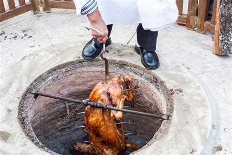 Roasted whole lamb, prepared in earth oven — Stock Photo © romrodinka ...