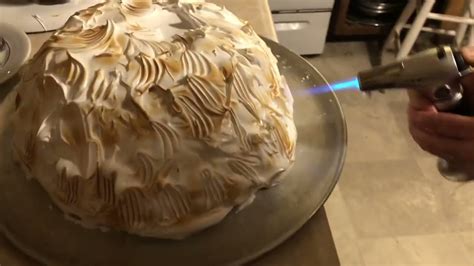 Toasting The Meringue On A Baked Alaska With A Kitchen Torch Youtube