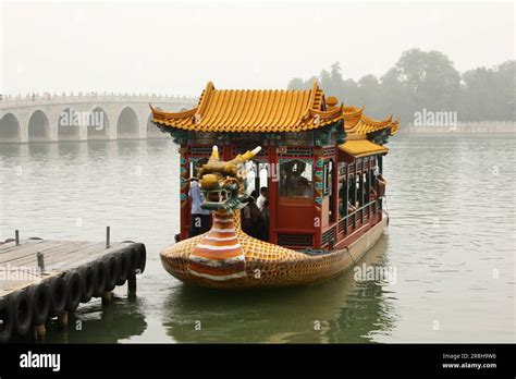 Boat on the Kunming Lake and the The Seventeen-arch Bridge. Summer Palace In Beijing. China ...