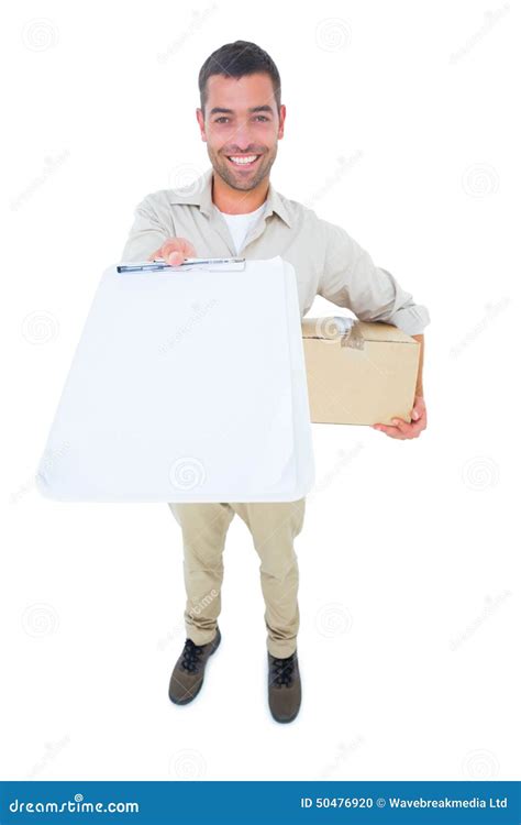 Delivery Man With Package Giving Clipboard For Signature Stock Photo