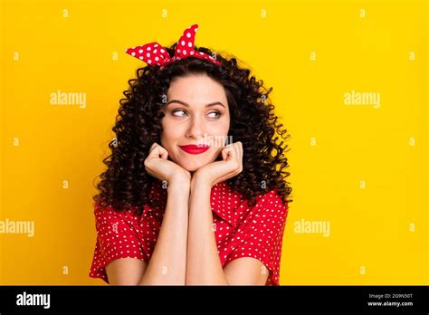 Portrait Of Nice Optimistic Brunette Curly Hair Lady Look Empty Space