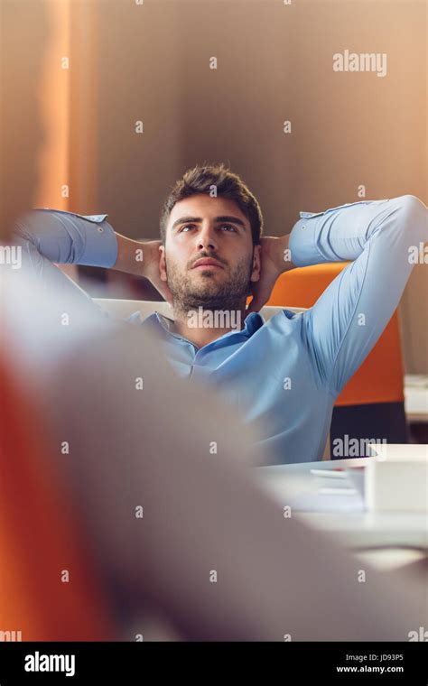 Caucasian Business Person Sitting In Office Thinking Daydreaming Hands