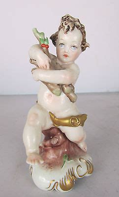 CAPODIMONTE FIGURE OF CHERUB BY GIUSEPPE CAPPE WINTER FOUR SEASONS