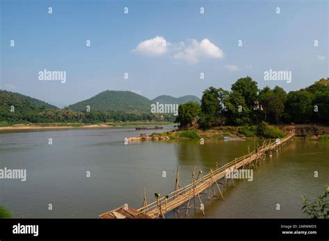 Image Of A Bamboo Bridge Crossing The Nam Khan River Near Its Mouth