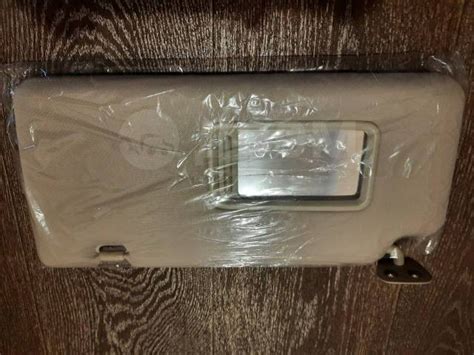 Купить Козырек солнцезащитный Nissan Tiida 2010, левый в Новосибирске ...