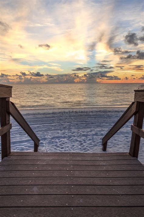 Boardwalk Leading To the Ocean at Vanderbilt Beach at Sunset Stock ...