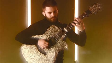 A Rhythmic Cover Of Daft Punks Lose Yourself To Dance Performed On A Glittery Gold Acoustic