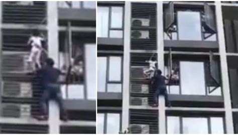 YouTube El heroico rescate de un padre que trepó edificio para salvar