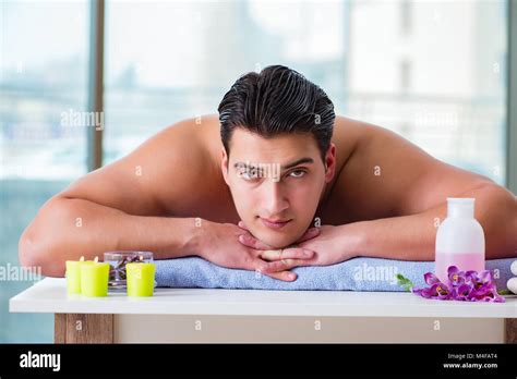 Handsome Man In Spa Massage Concept Stock Photo Alamy