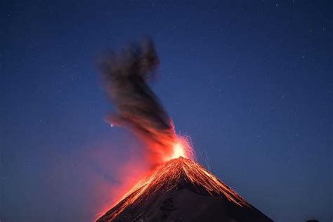 Capturing A Volcano Erupting Under The Milky Way In Guatemala