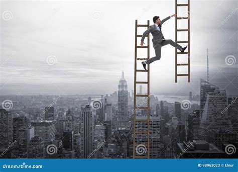 The Businessman Climbing Career Ladder In Business Concept Stock Image