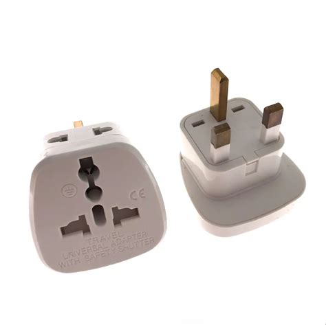 White Multifunctional Eu Au Us To Uk Plugs Adapter Power Converter