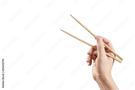 Male Hand Holding Chopsticks Isolated On White Background Stock Photo