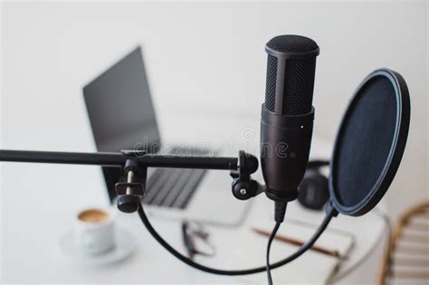 Microphone, Earphones and Laptop on Table. Podcast Stock Photo - Image ...