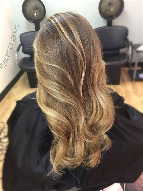 Dark Roots With Sun Kissed Honey Platinum Warm Pearl Blonde Balayage