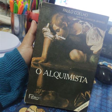 LIVRO O ALQUIMISTA PAULO COELHO LIVRO USADO E MARCAS DE USO