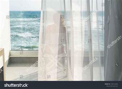 Naked Beautiful Female Bikini Sitting On Stock Photo 1298125246 Shutterstock