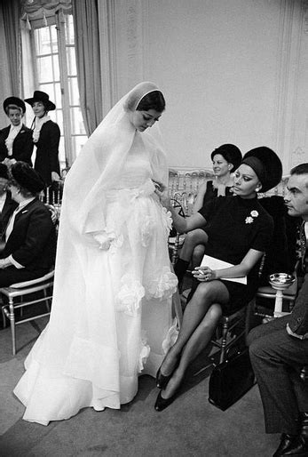 Sophia Loren At A Christian Dior Fashion Show Admiring The Wedding Gown